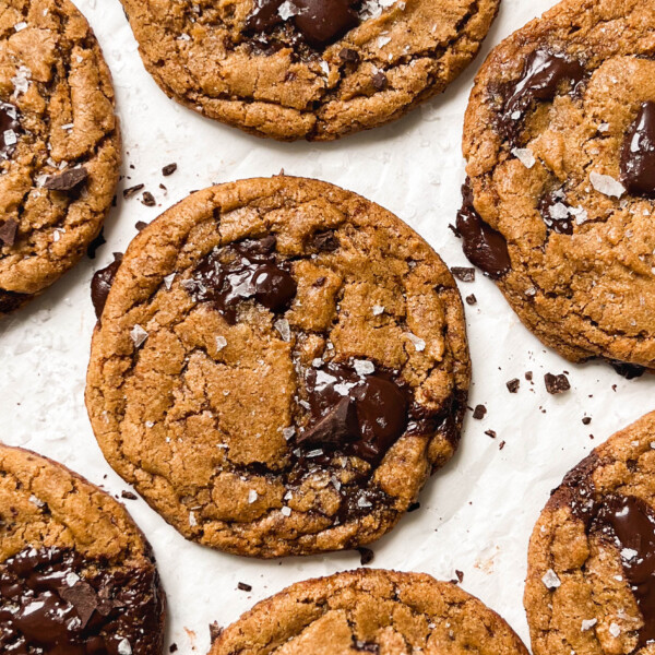 vegan chocolate chip cookies on parchment paper