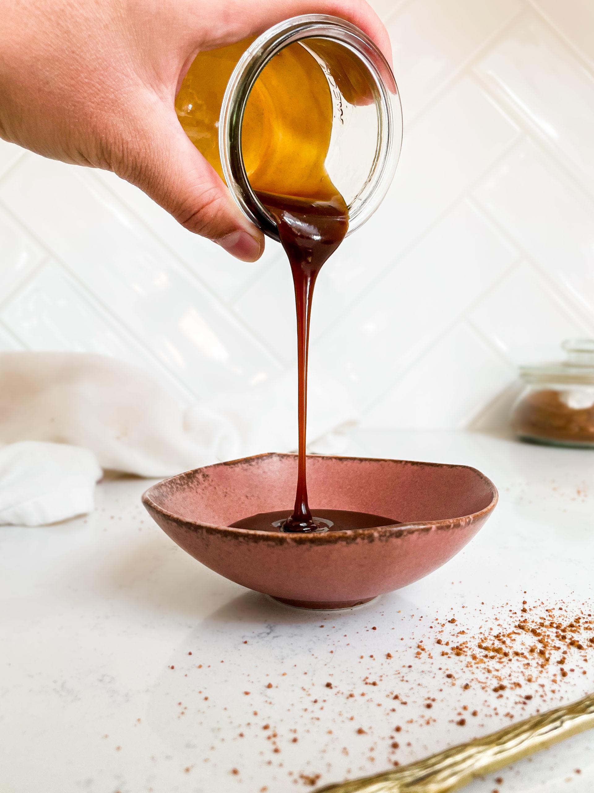 caramel pouring into a bowl