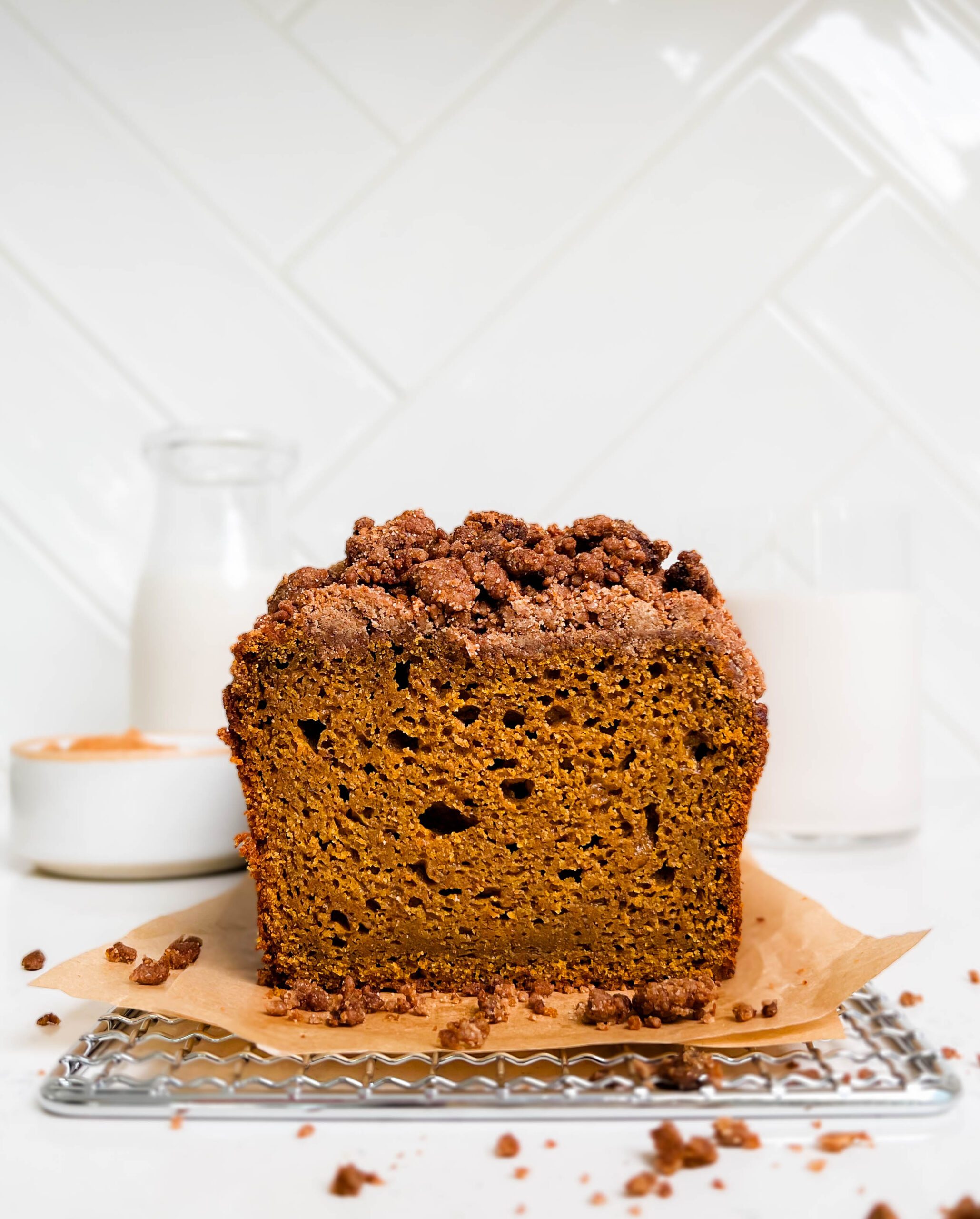 vegan pumpkin bread on a wire rack