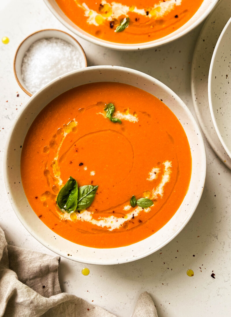 roasted tomato soup in a speckled bowl