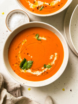 roasted tomato soup in a speckled bowl