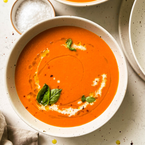 roasted tomato soup in a speckled bowl