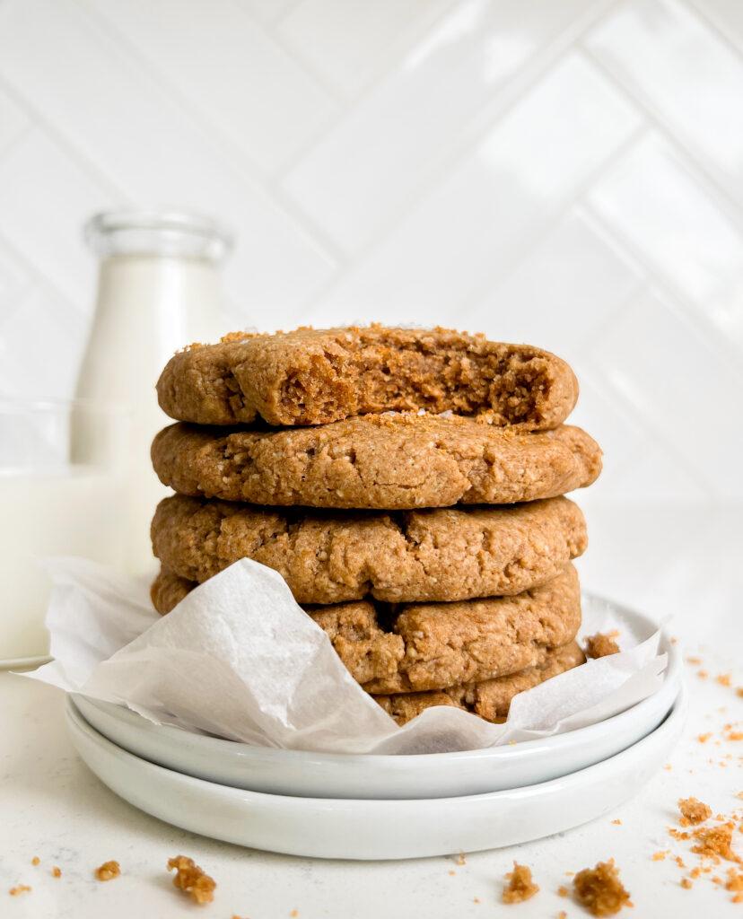 chewy vegan chai cookies stacked on top of a white plate