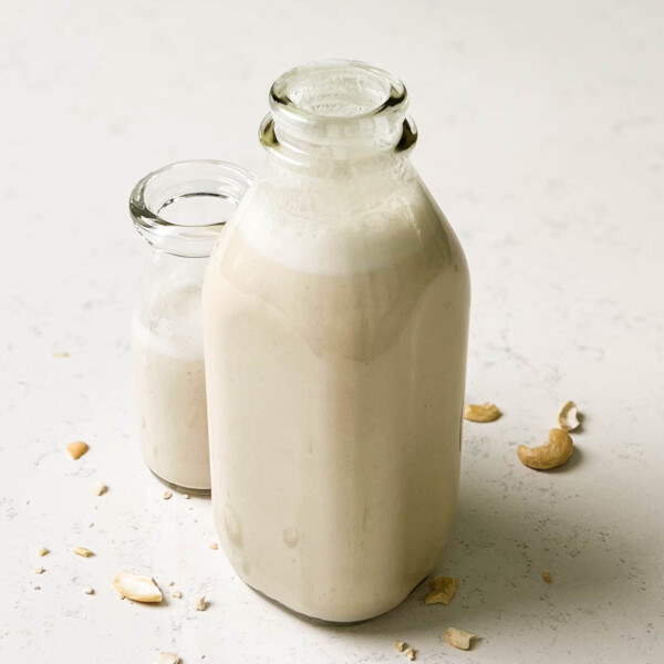 cashew milk in a glass bottle