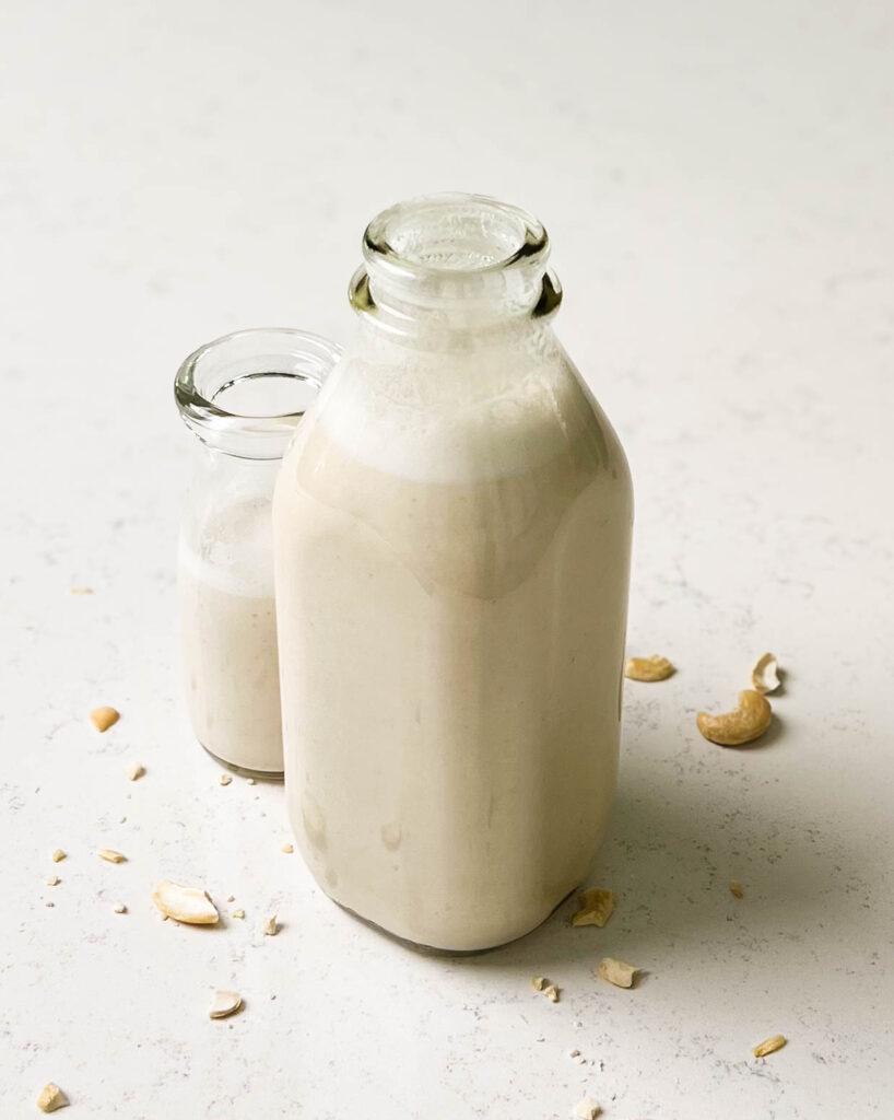 cashew milk in a glass bottle