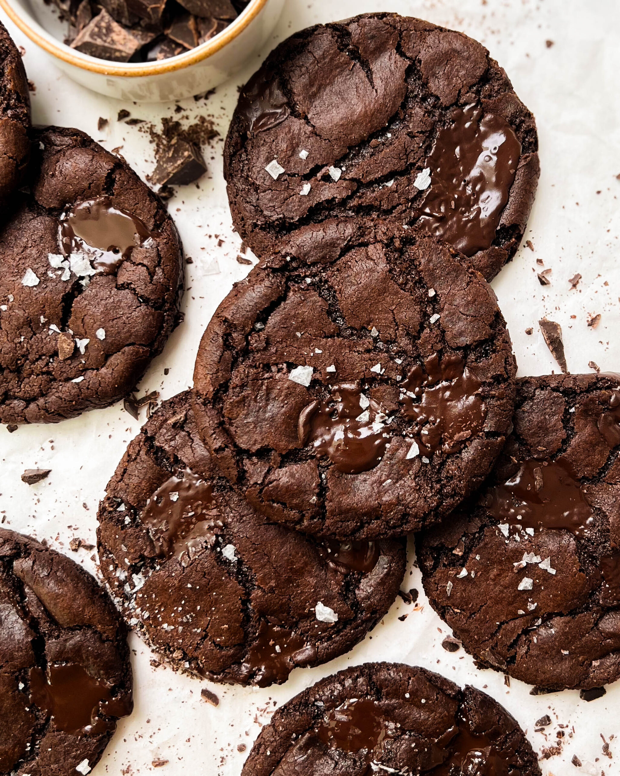 vegan double chocolate chip cookies on parchment paper