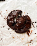 vegan double chocolate chip cookies on parchment paper