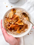 vanilla oatmeal with caramelized cinnamon sugar apples and sunflower butter on top