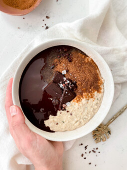 creamy vanilla oatmeal topped with cinnamon sugar and chocolate ganache