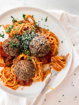 vegan tofu meatballs with spaghetti on a plate