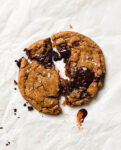 vegan single-serve chocolate chip cookie on parchment paper