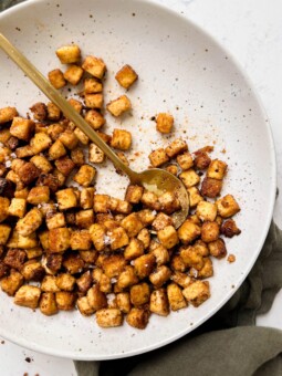 speckled plate of spicy and crispy baked tofu