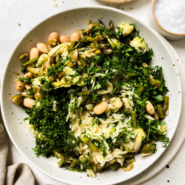 spring orzo pasta salad in a white bowl