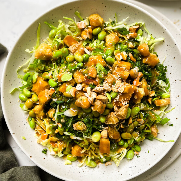 cashew crunch salad in a white bowl