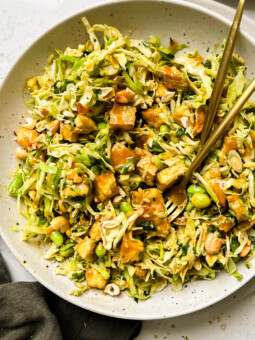 cashew crunch salad in a white bowl