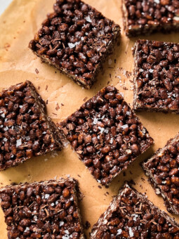 healthy chocolate rice krispie treats on parchment paper