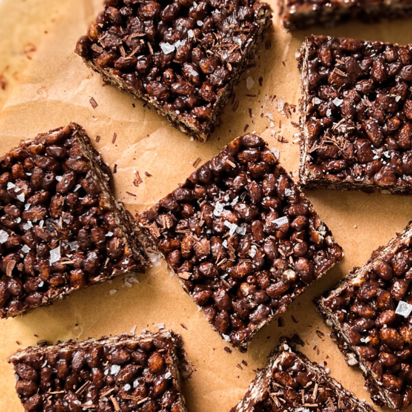 healthy chocolate rice krispie treats on parchment paper