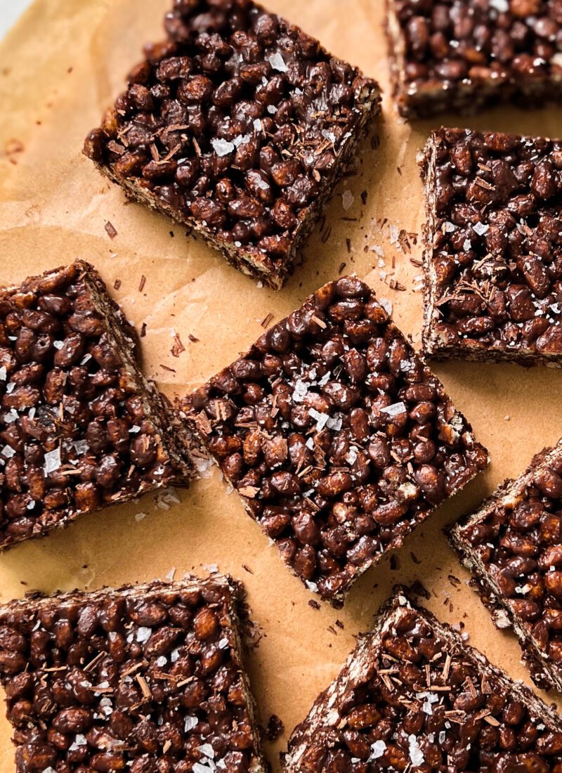healthy chocolate rice krispie treats on parchment paper
