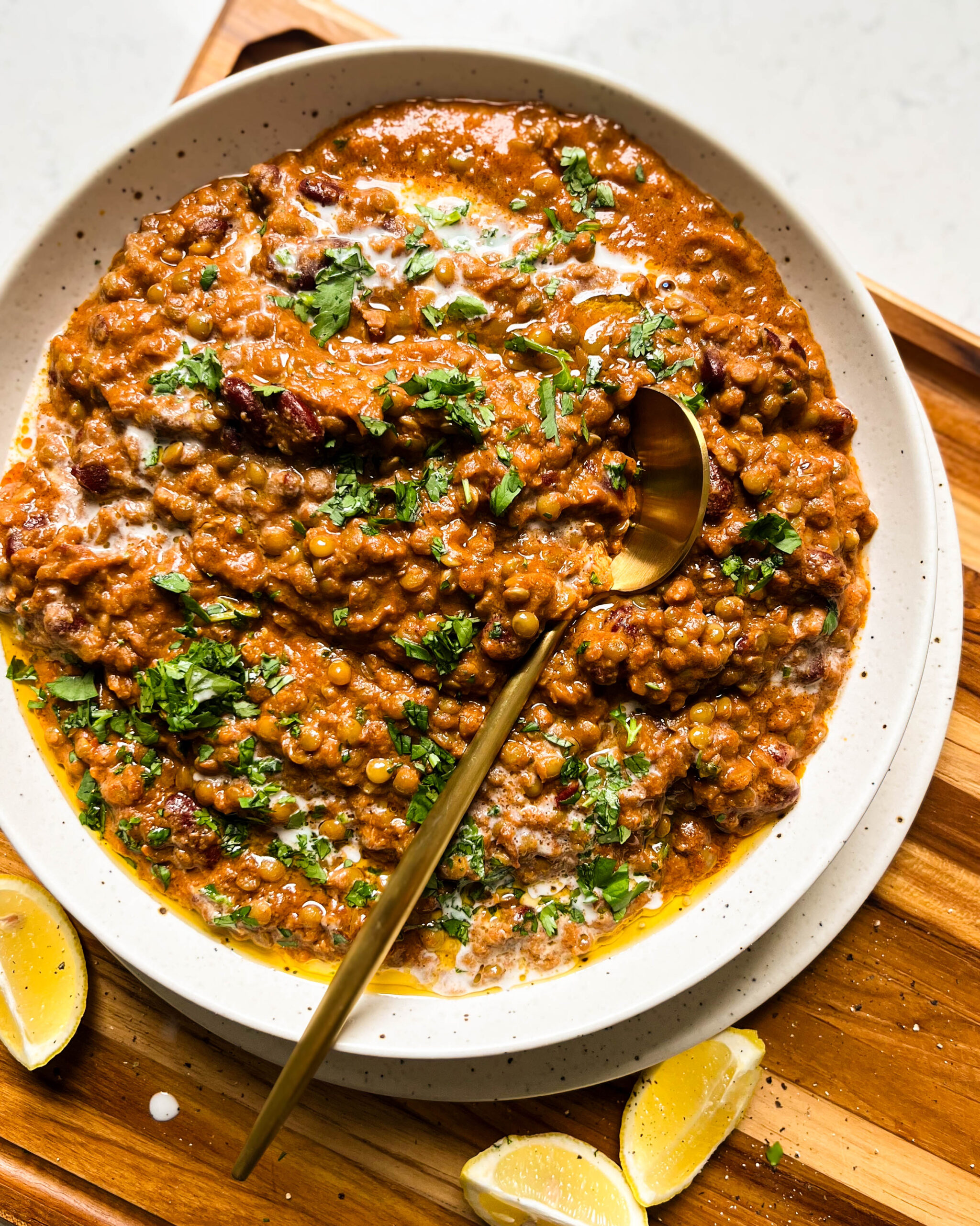 vegan dal makhani in a speckled bowl