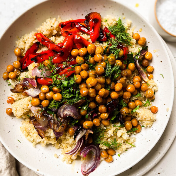 roasted red pepper salad in a white bowl