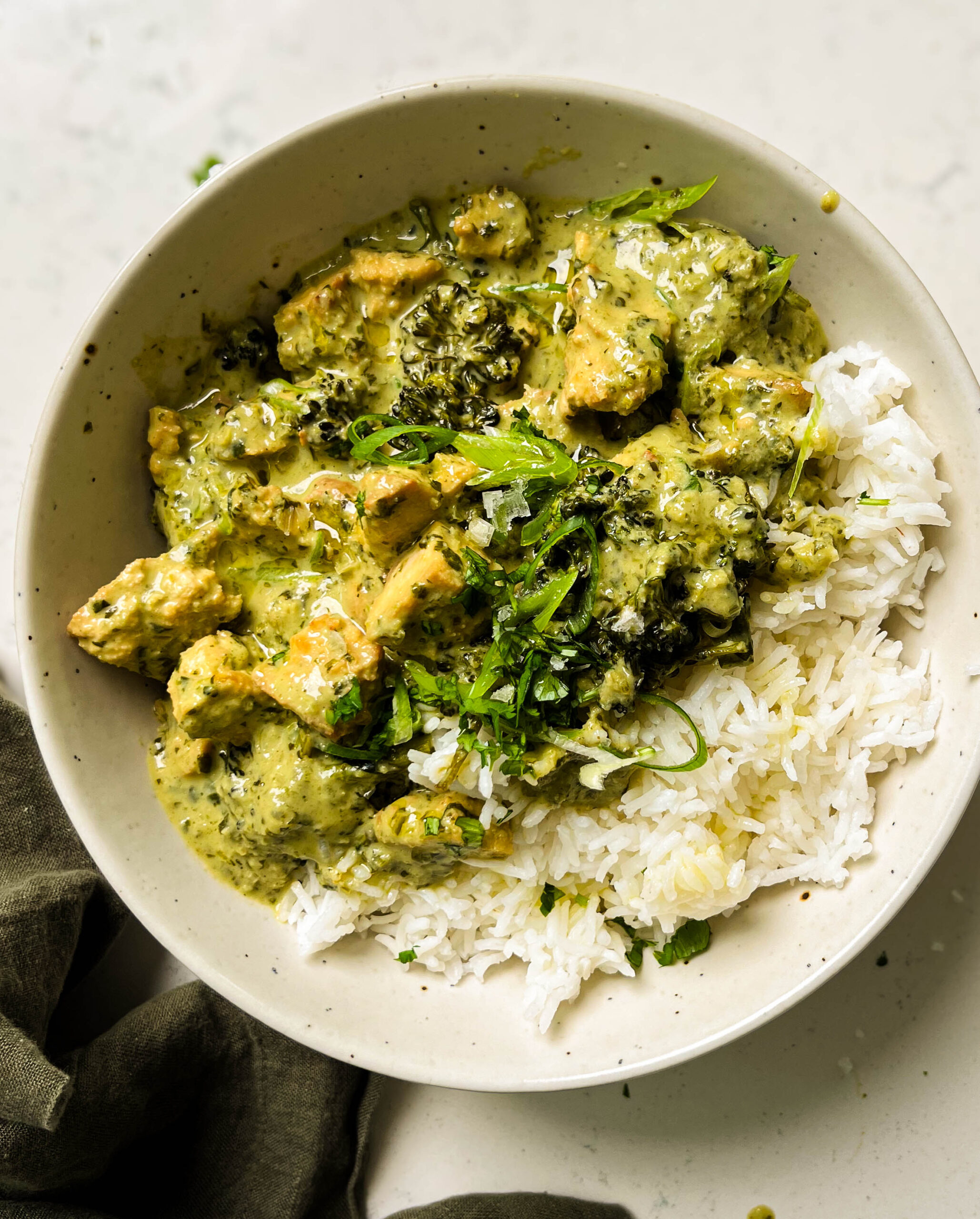 vegan thai green curry over a bowl of rice