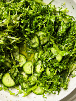 pickled cucumber salad in a white bowl