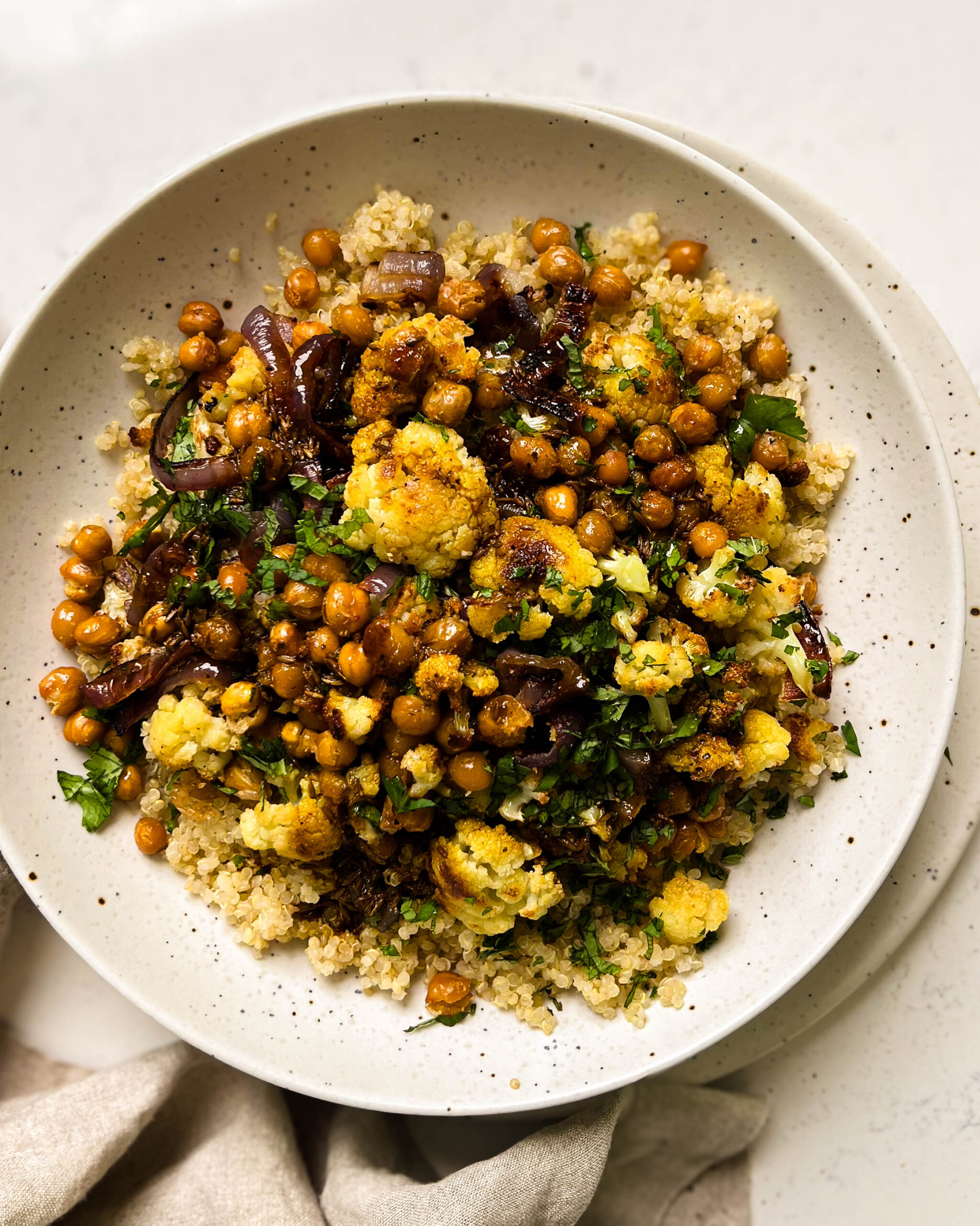 cauliflower salad in a white bowl