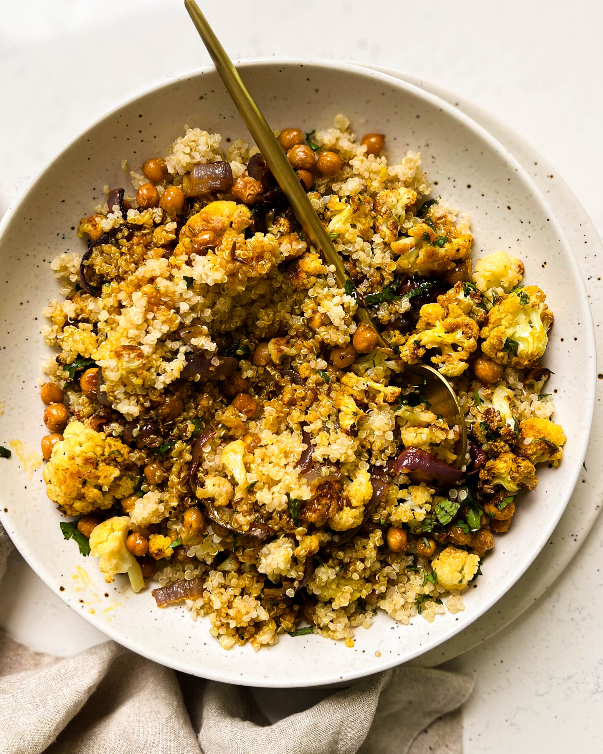 cauliflower salad in a white bowl