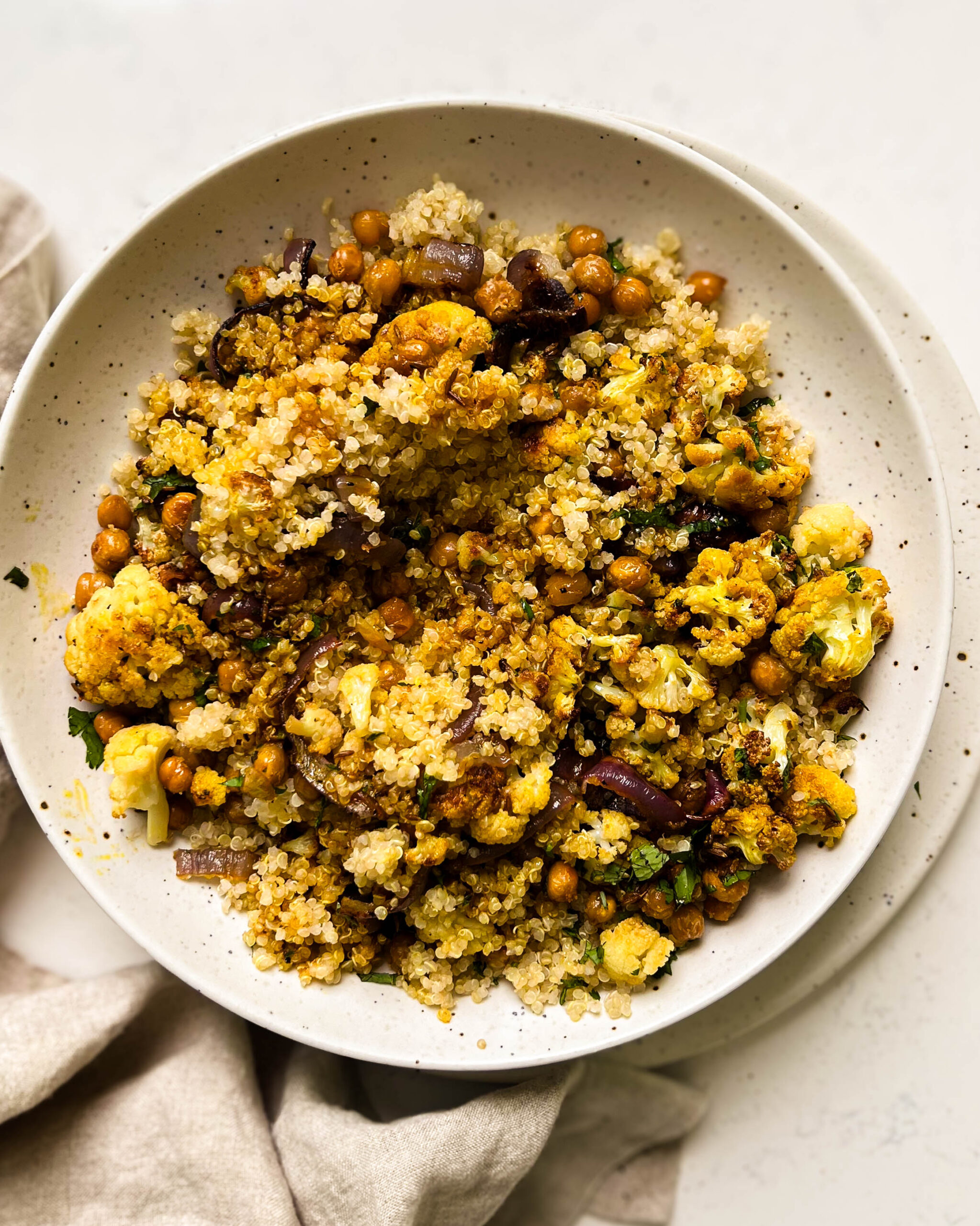 cauliflower salad in a white bowl