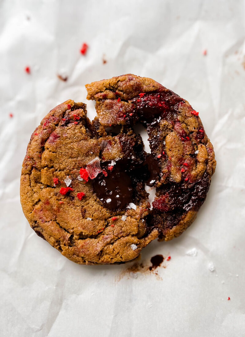 raspberry chocolate chunk cookie on parchment paper