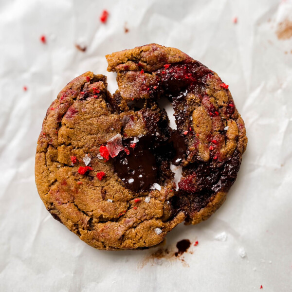 raspberry chocolate chunk cookie on parchment paper