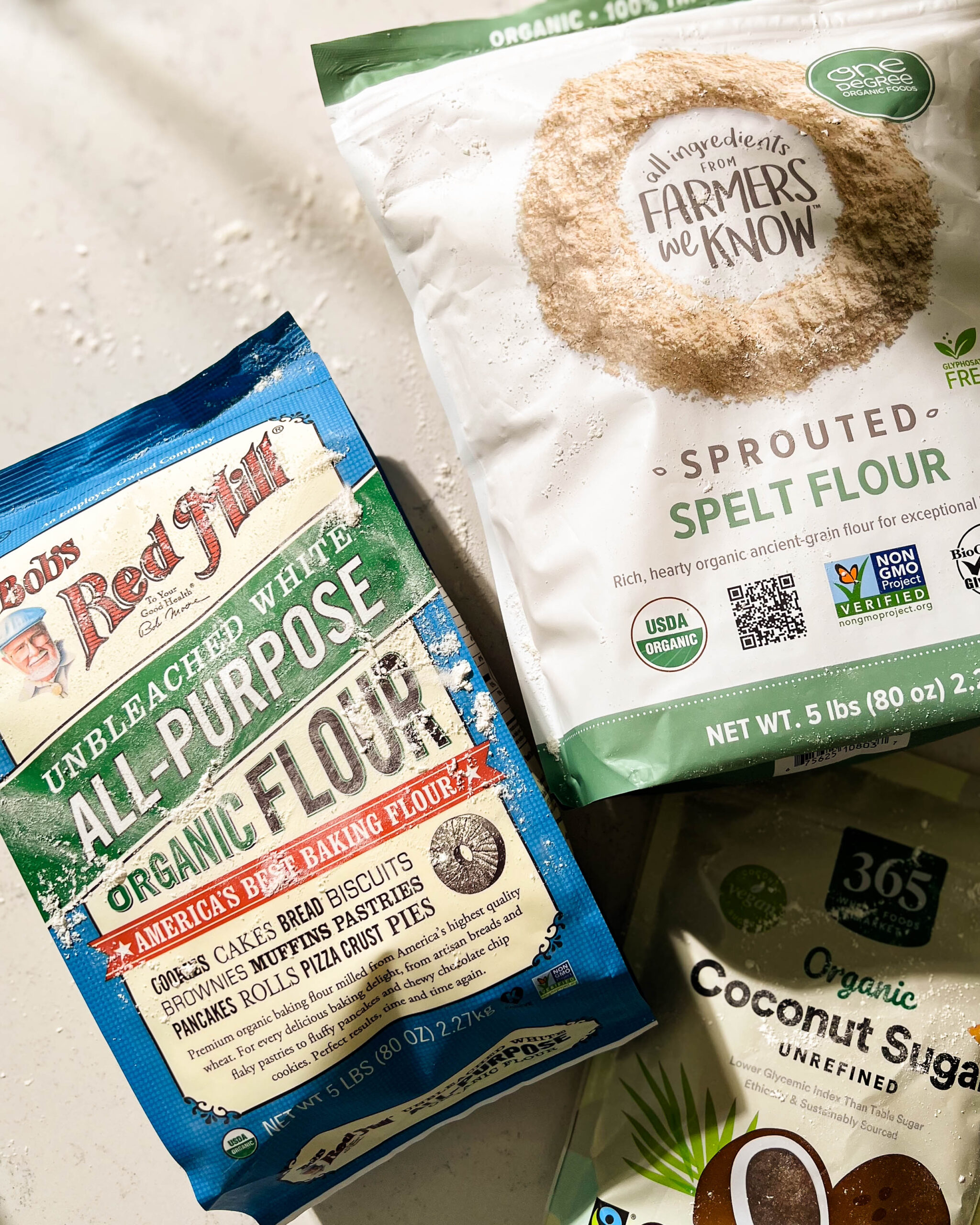 bags of flour on a white counter