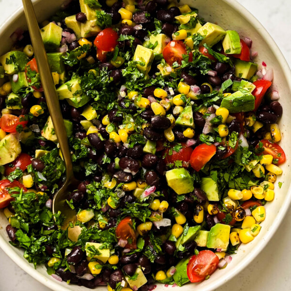 black bean salad in a beige bowl