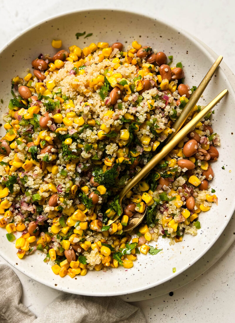 charred corn salad in a beige bowl