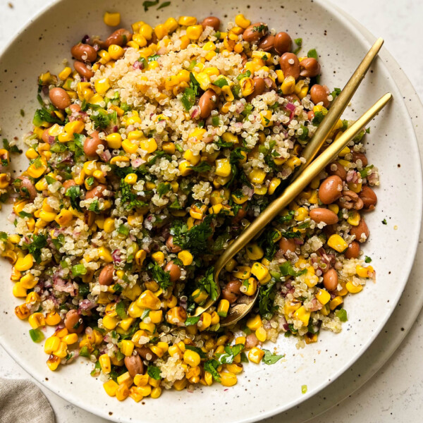 charred corn salad in a beige bowl