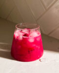 dragon fruit lemonade in a glass cup