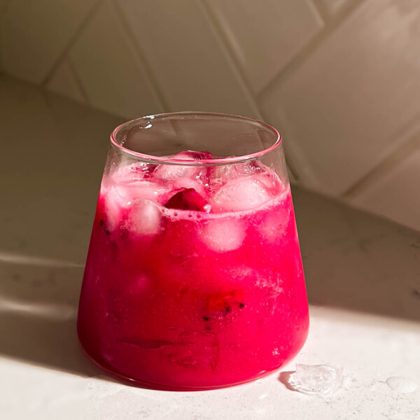 dragon fruit lemonade in a glass cup