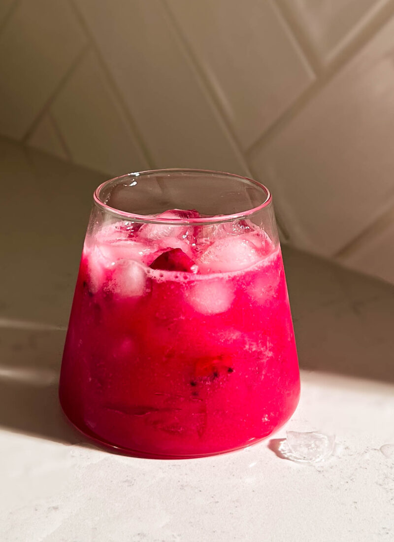 dragon fruit lemonade in a glass cup