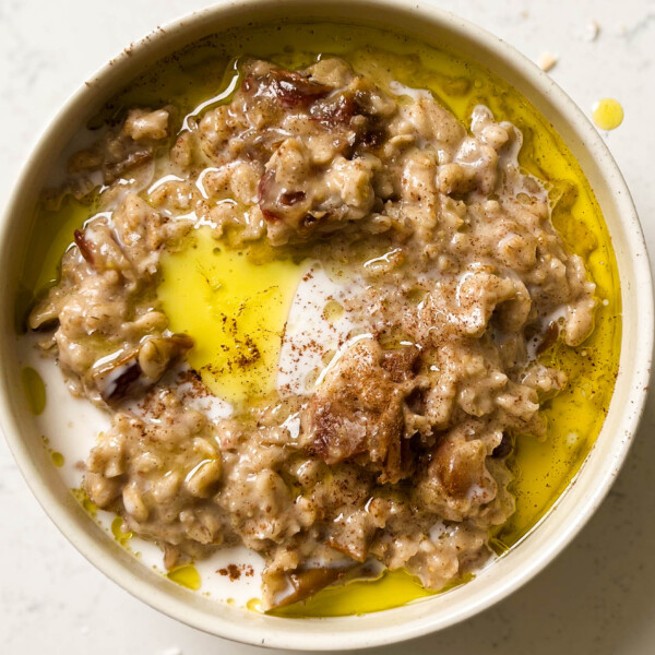 date oatmeal in a bowl with olive oil on top