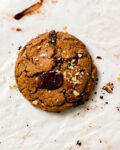 single-serve pumpkin chocolate chip cookie on parchment paper