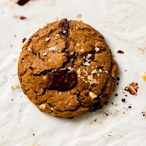 single-serve pumpkin chocolate chip cookie on parchment paper