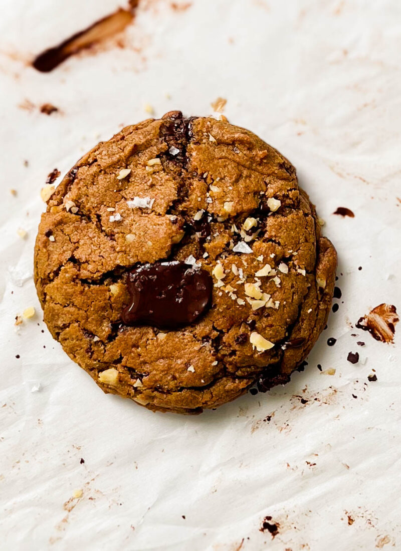 single-serve pumpkin chocolate chip cookie on parchment paper