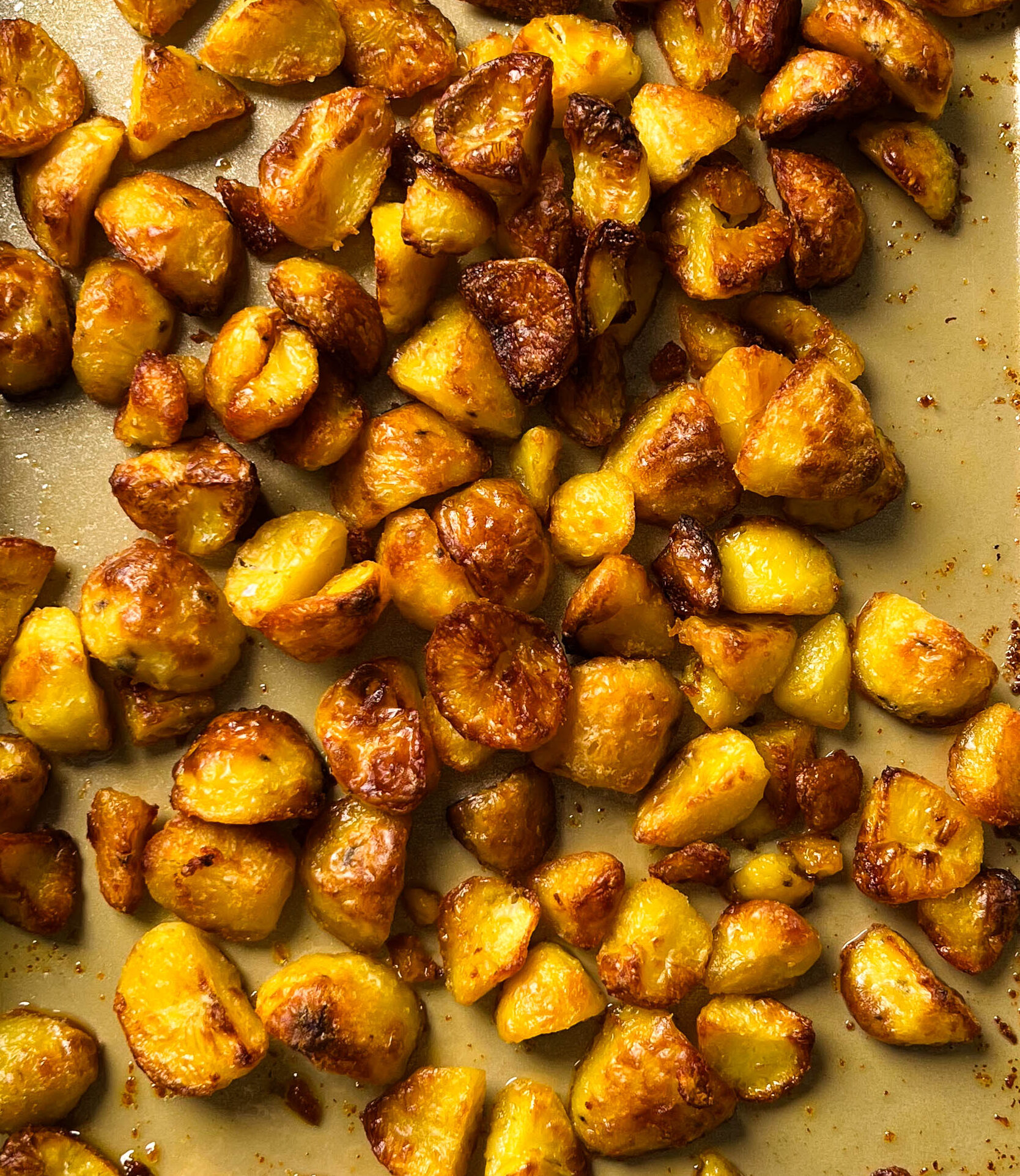 crispy roasted potatoes on a sheet pan