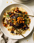 butternut squash salad in a speckled white bowl