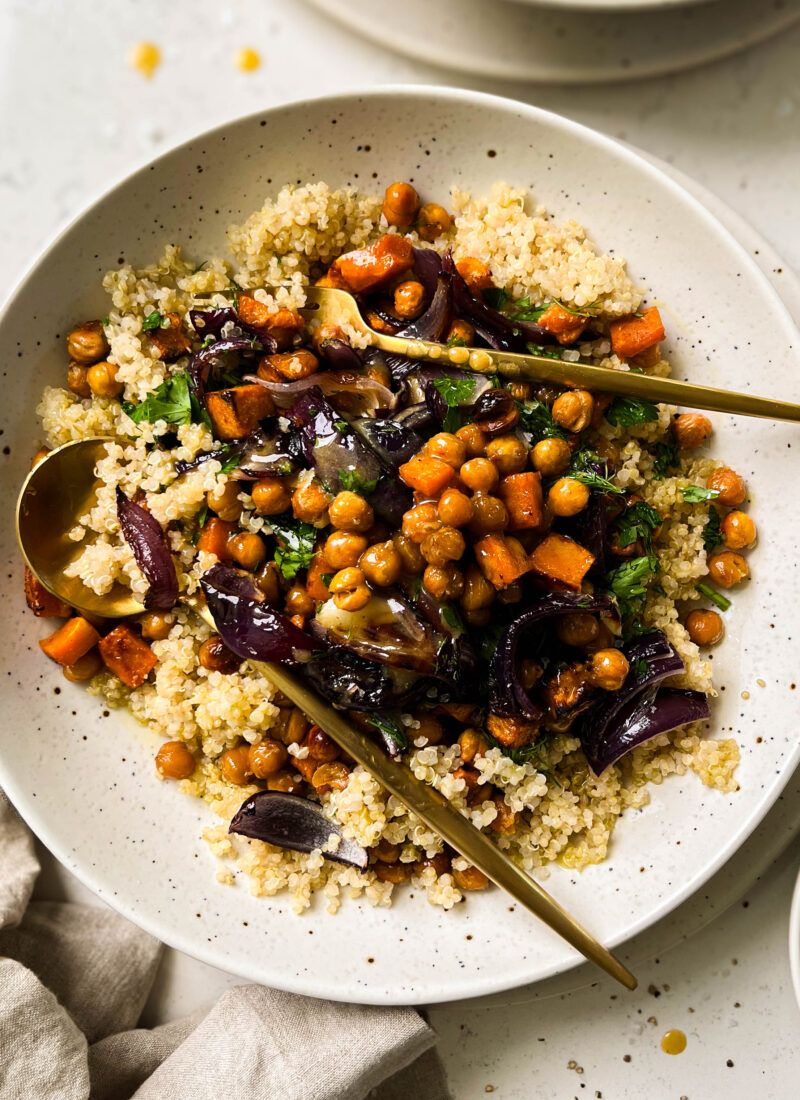 butternut squash salad in a speckled white bowl