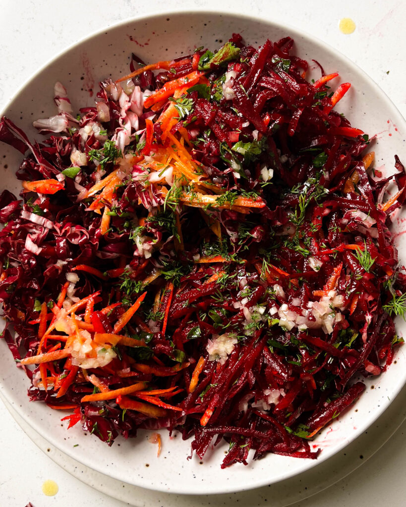 grated beet salad in a bowl