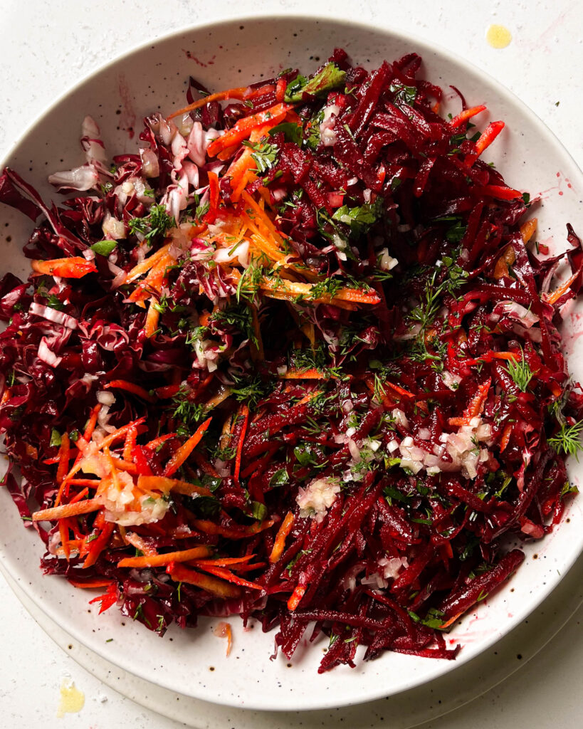 grated beet salad in a bowl