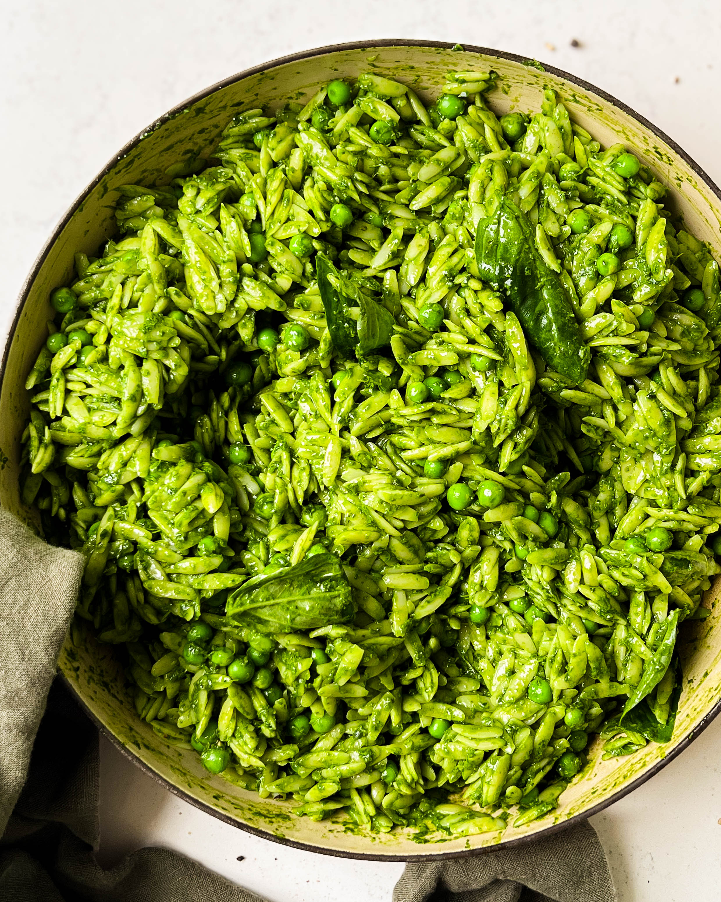 spring greens orzo in a pan