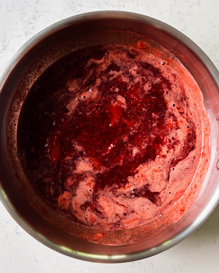 strawberry syrup in a large stainless steel pot