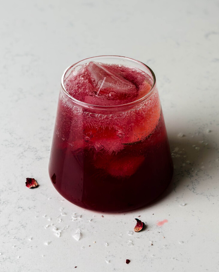 cherry hibiscus refresher in a glass cup